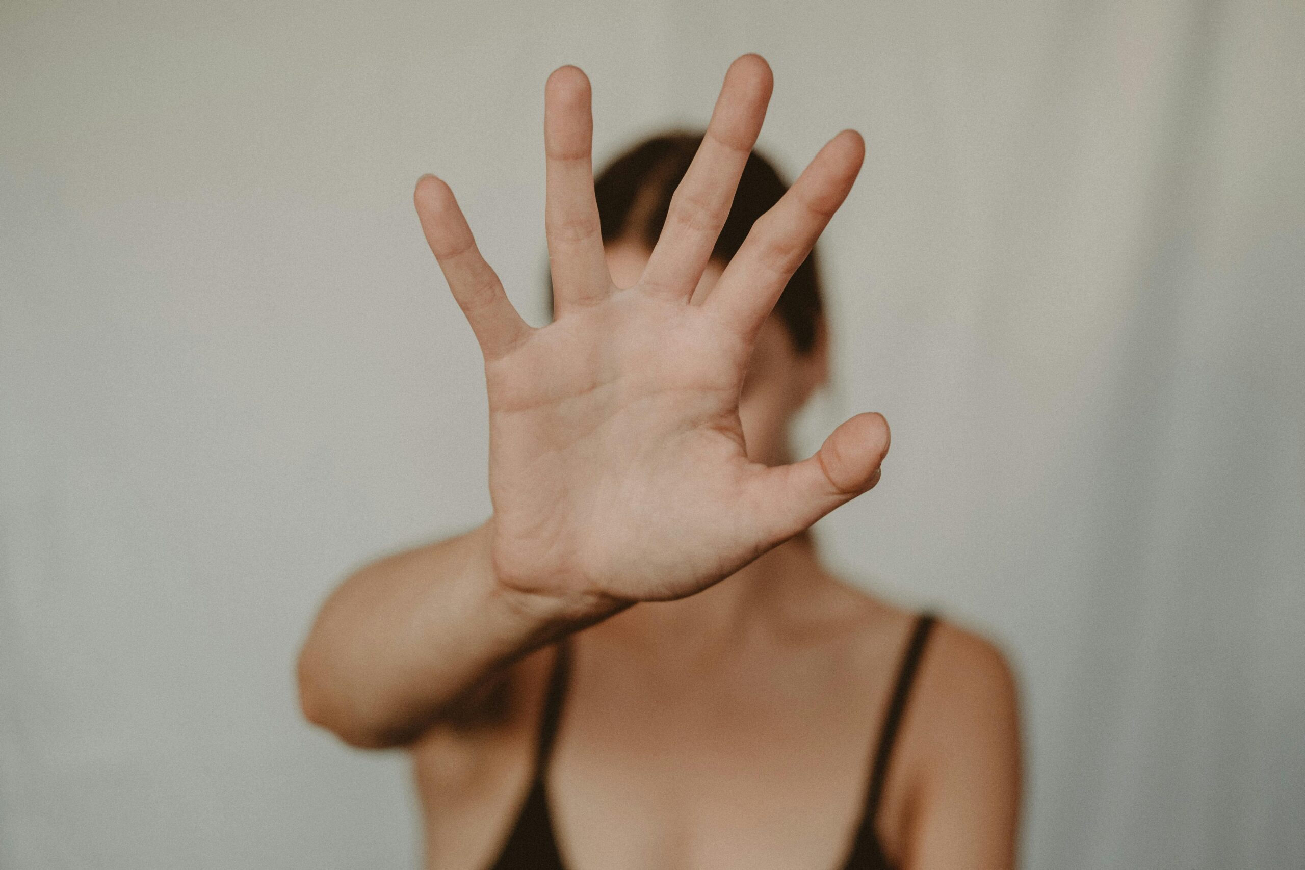 Woman Showing Stop Gesture with Hand